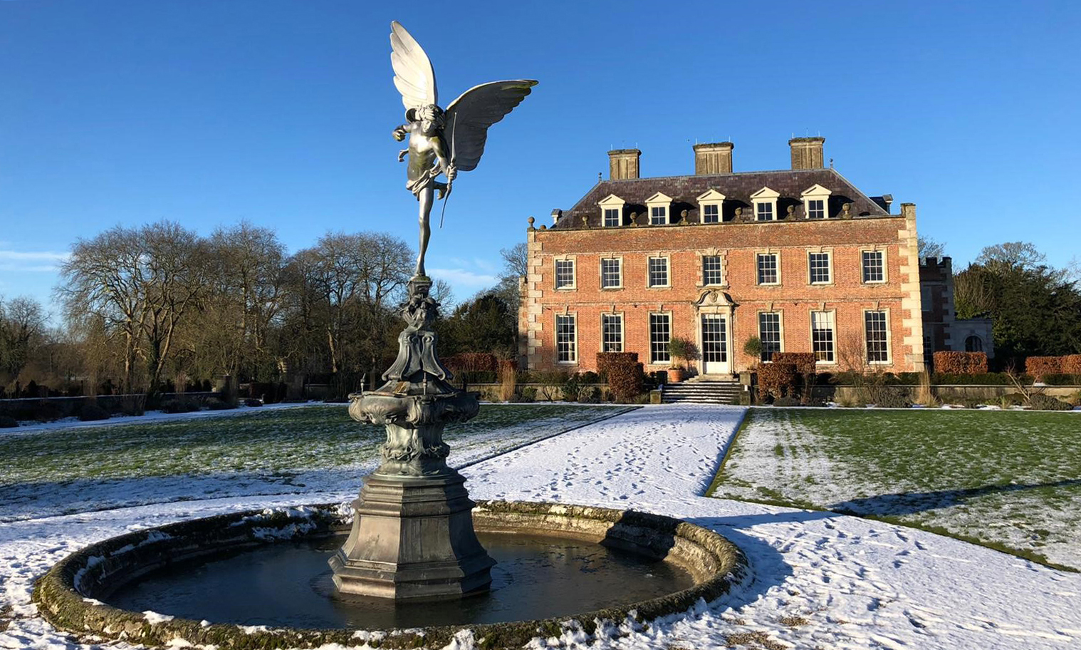 A picture of St Giles House in the snow