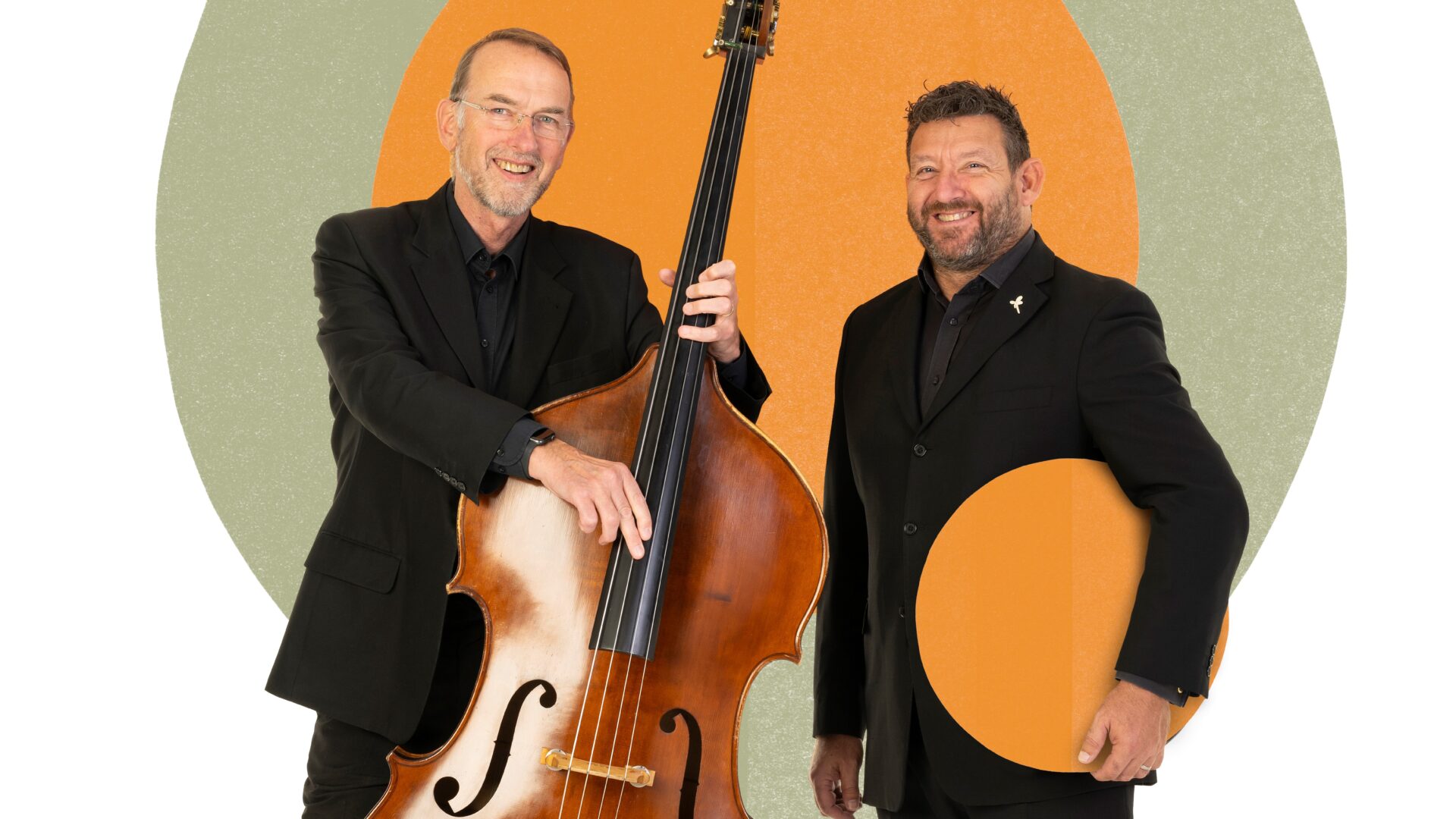Two BSO musicians, one holding a double bass