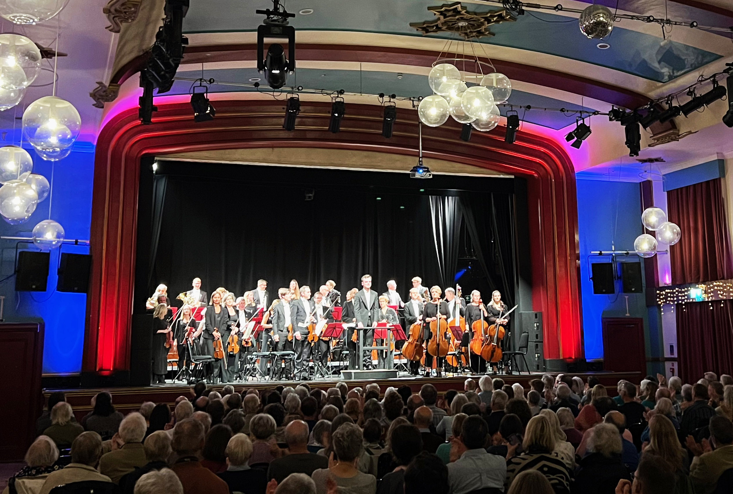 The Orchestra and conductor Tom Fetherstonhaugh at Exmouth Pavilion