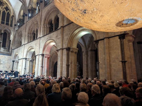 “Mars, The Bringer of War” performed under Mars art installation at Chichester Cathedral