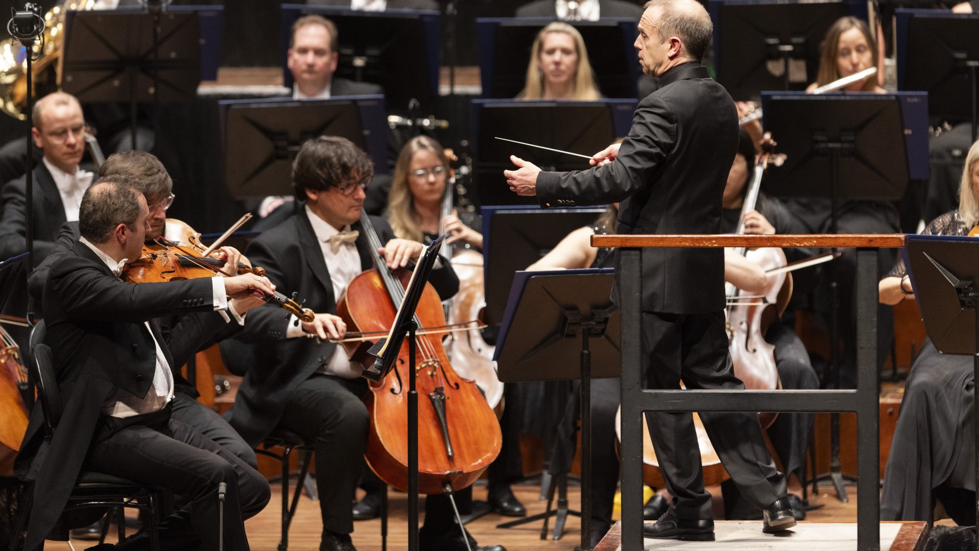 Conductor Mark Wigglesworth on stage with Bournemouth Symphony Orchestra