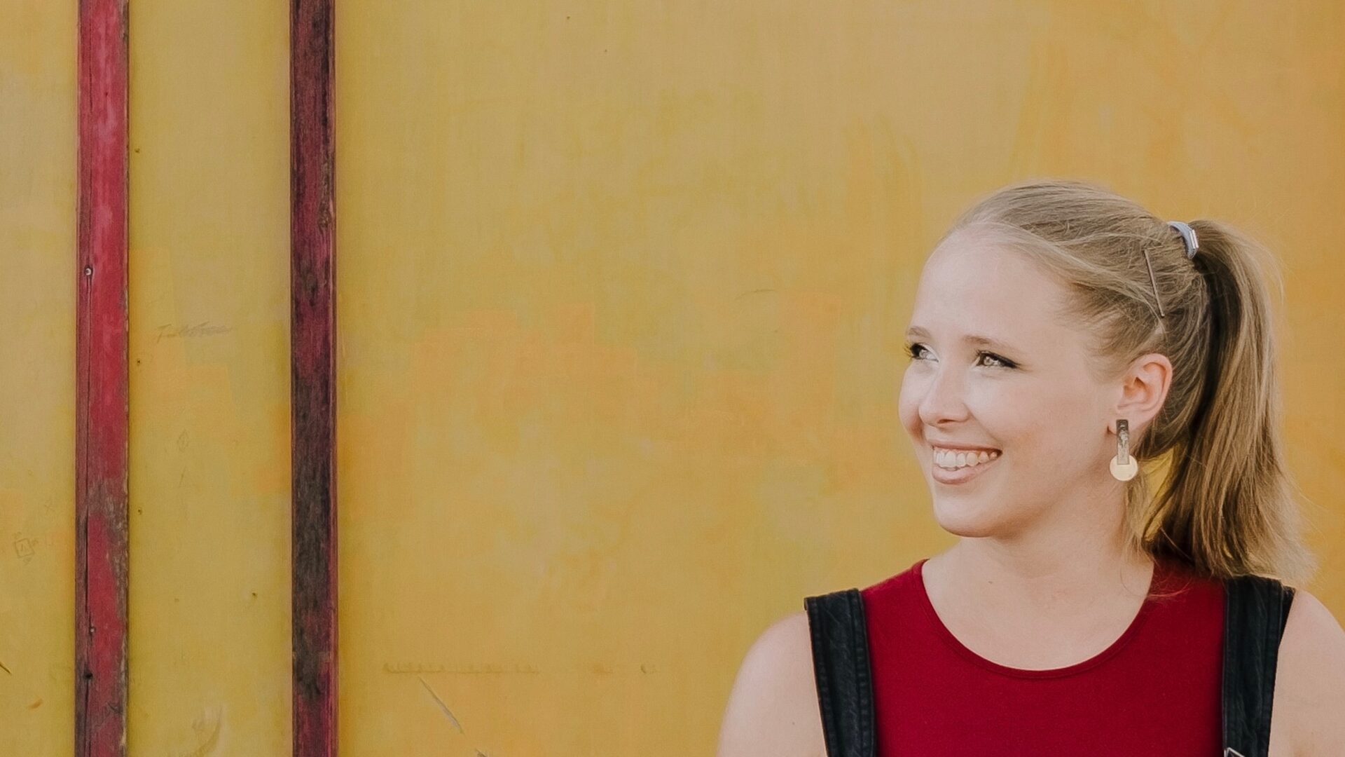 Composer Dani Howard looks to her right-hand side