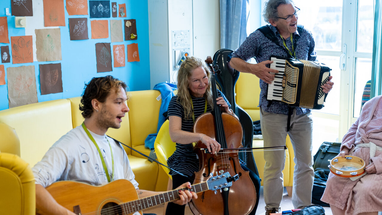 The BSO gang serenading patients with song requests on the elderly care unit