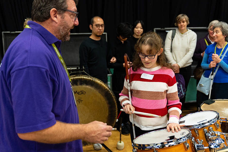 Young musician has a touch tour of Bournemouth Symphony Orchestra's percussion instruments, guided by a professional player.