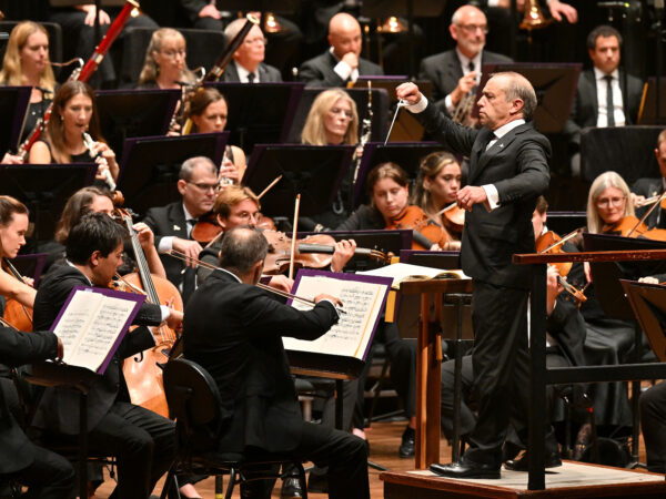REVIEW: “A large orchestra delivered colour in great broad sweeps, as well as moments of tender introspection.”